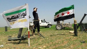 عناصر من لواء المعتصم على إحدى جبهات ريف حلب