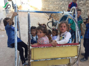 أفراح الأطفال بالعيد في مدينة الأتارب في حلب - المصدر تجمع ثوار سوريا